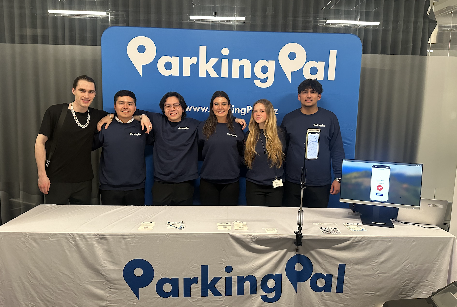 ParkingPal team at conference booth
